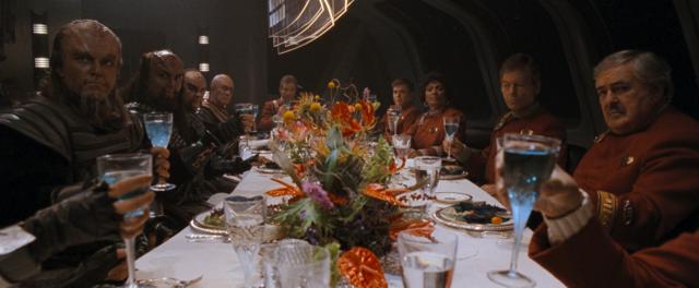 Screenshot of the Enterprise crew and the Klingon crew they are escorting having dinner together